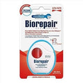 خيط أسنان Biorepair Ultra Flat Waxed، وهو خيط تنظيف متطور مصمم خصيصاً للمساحات الضيقة جداً بين الأسنان.