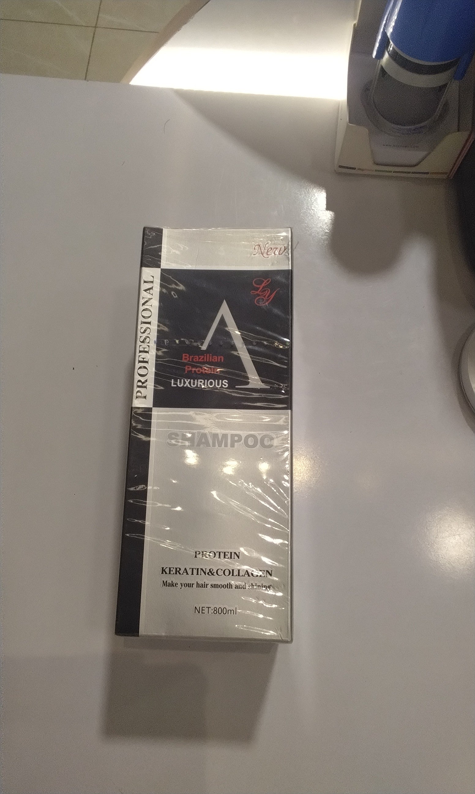 شامبو البروتين البرازيلي الفاخر (A Brazilian Protein Luxurious Shampoo)،